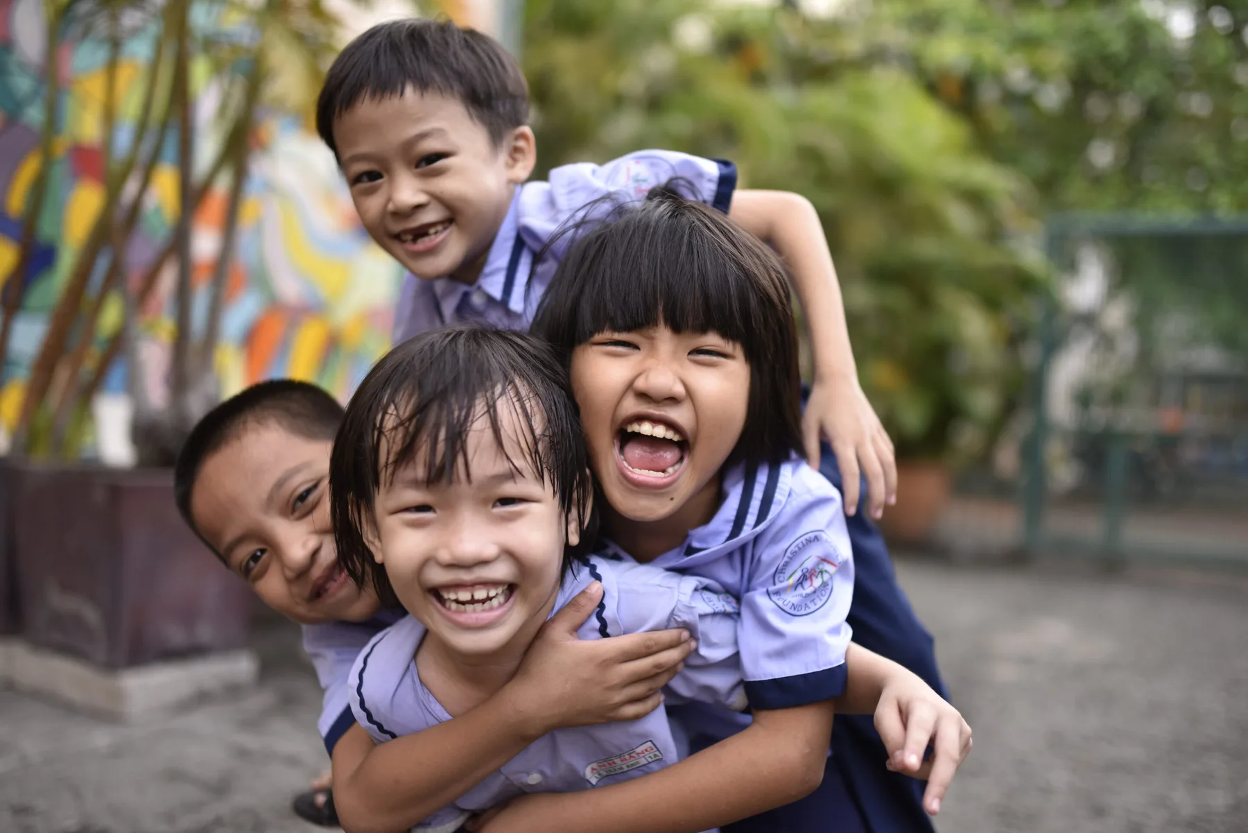 Children laughing in a CNCF programme